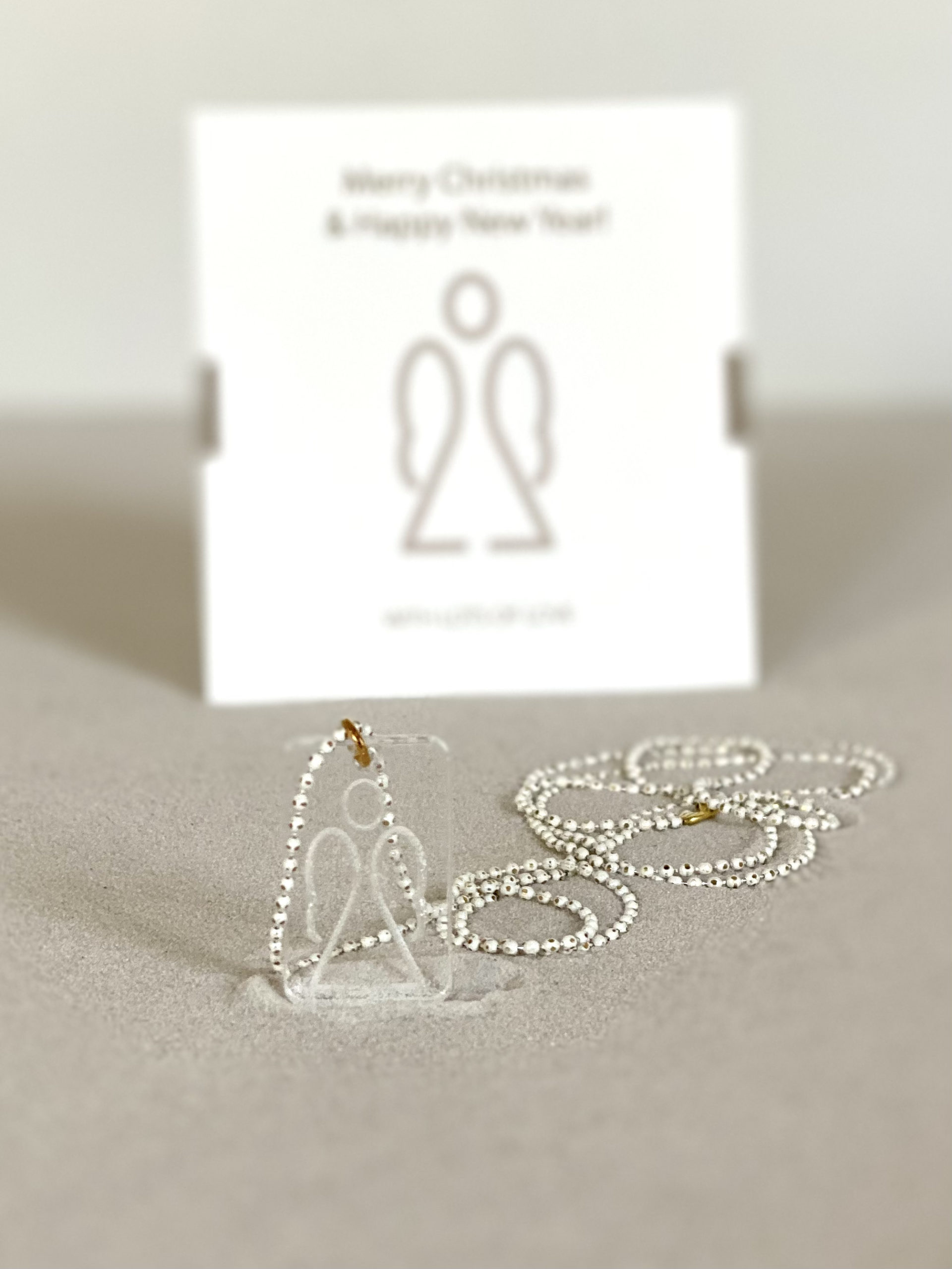 white-christmas-special-occasion-lucky-charm-angel-chain-necklace-with-card-closeup