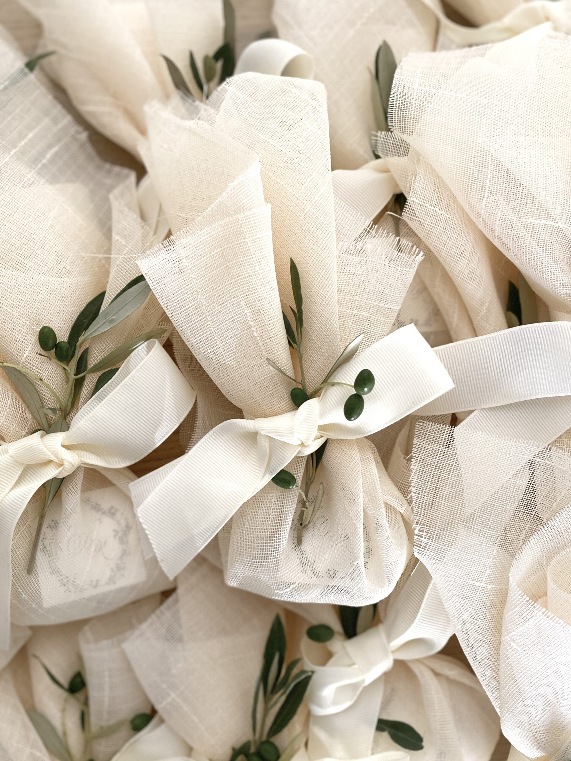 a-step-back-in-time-wedding-favors-traditional-olive-leaves-linen
