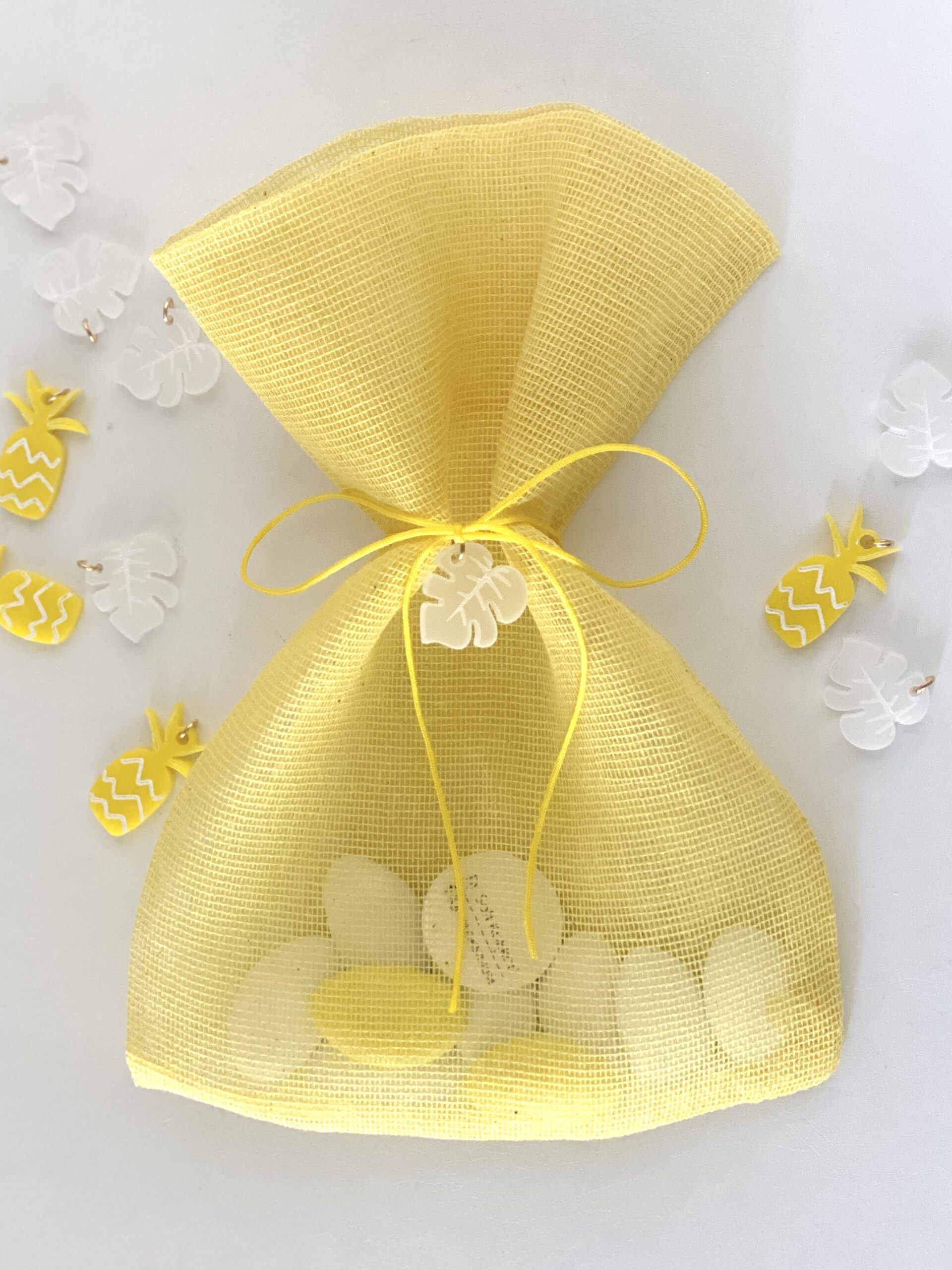 aloha-baptism-favors-gauze-pouch-yellow-acrylic-ornaments