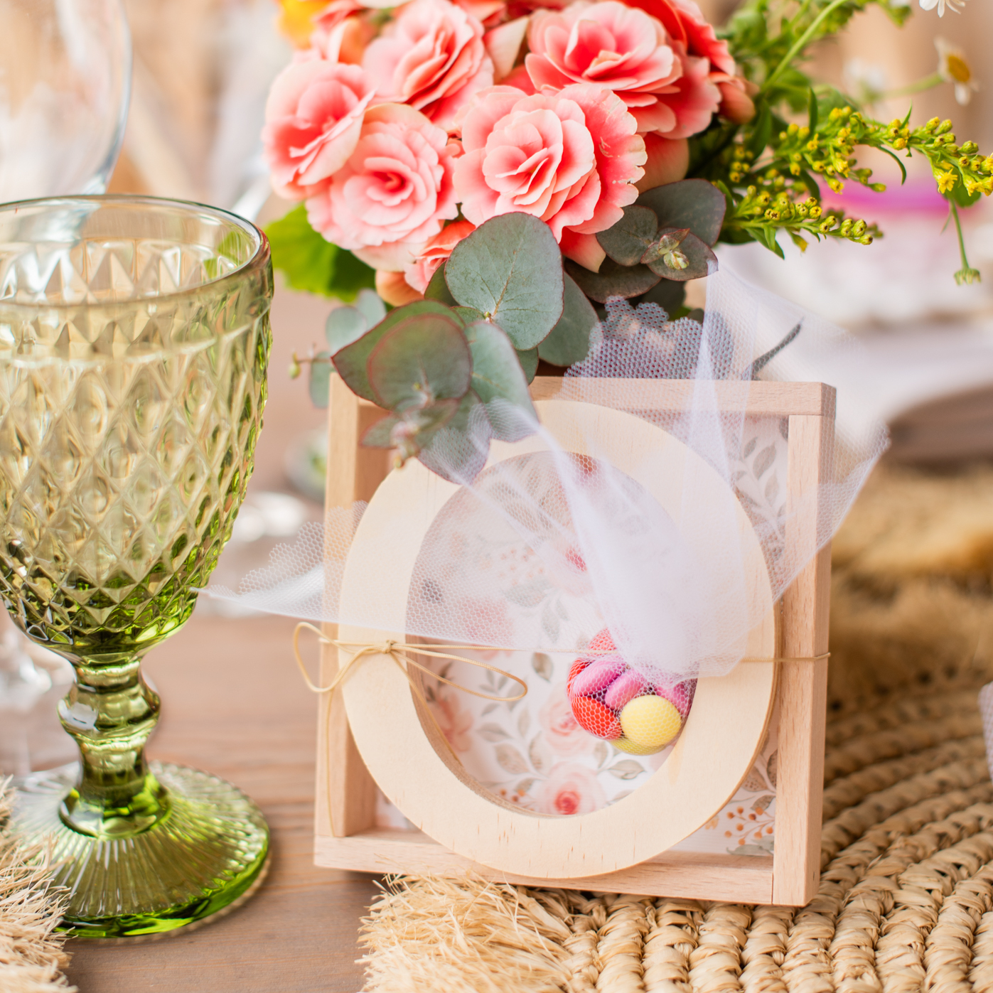 bright-and-playful-baptism-kids-favors-table-set-flowers-main-photo