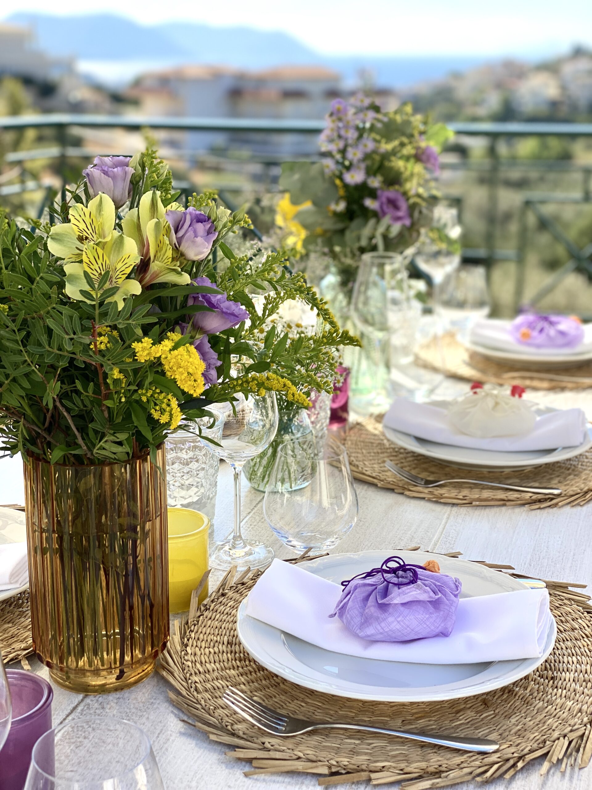 color-palette-yellow-and-purple-baptism-table-setup