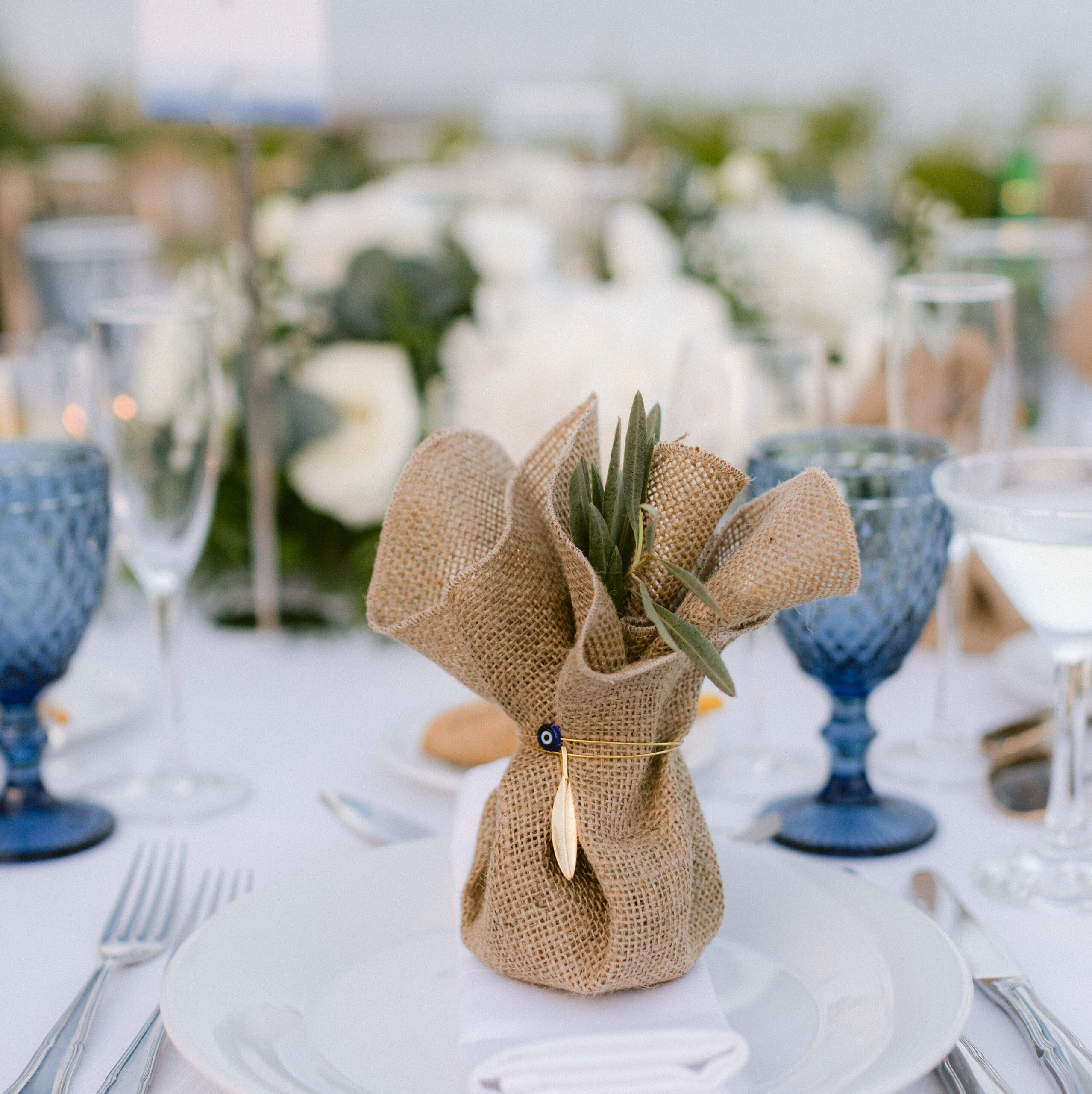colors-of-greece-wedding-favors-burlap-gold-olive-leaf-table-decoration-main-photo